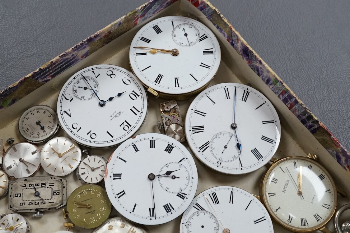 A quantity of assorted wrist and pocket watch movements, including Omega and Omega automatic, together with a pocket watch and a 935 white metal fob watch.